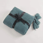 Coperta in lana lavorata a maglia con frange - NordicCozy