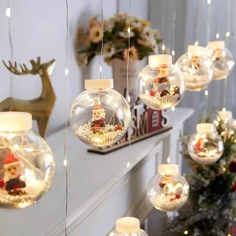 Decorazioni natalizie con luci a forma di sfera che desiderano