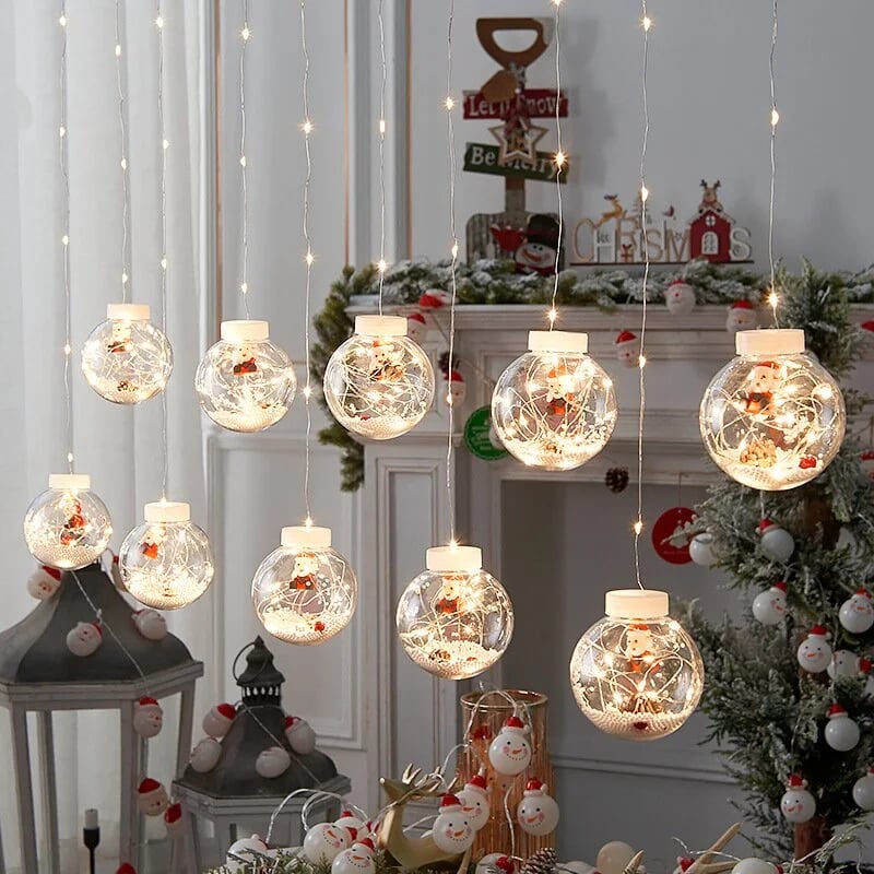 Decorazioni natalizie con luci a forma di sfera che desiderano