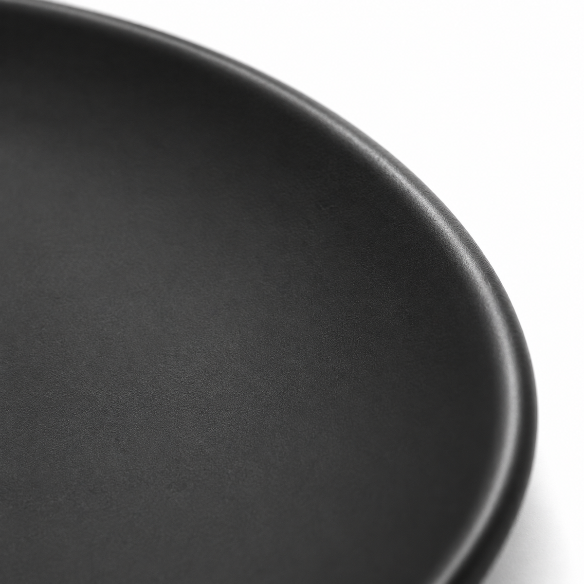 Piatto nero elegante per tavola moderna