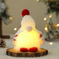 Nuova bambola senza volto di Natale con luci