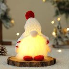 Nuova bambola senza volto di Natale con luci