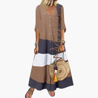 Abito lungo in maglia da donna: scollo a V, spalline laterali