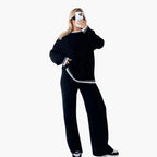 Set da salotto alla moda per donna, comodo top e pantaloni in maglia