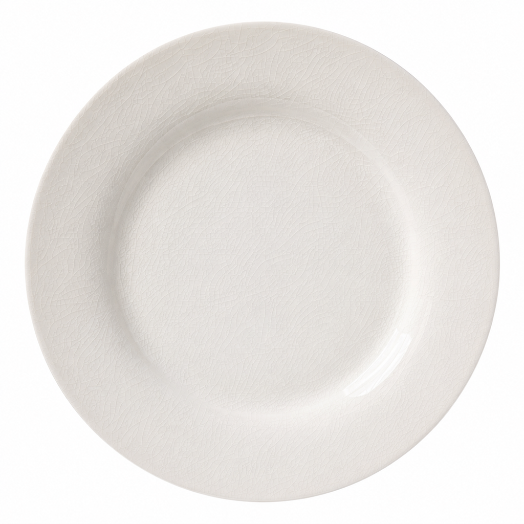 Vista laterale del piatto in ceramica bianco