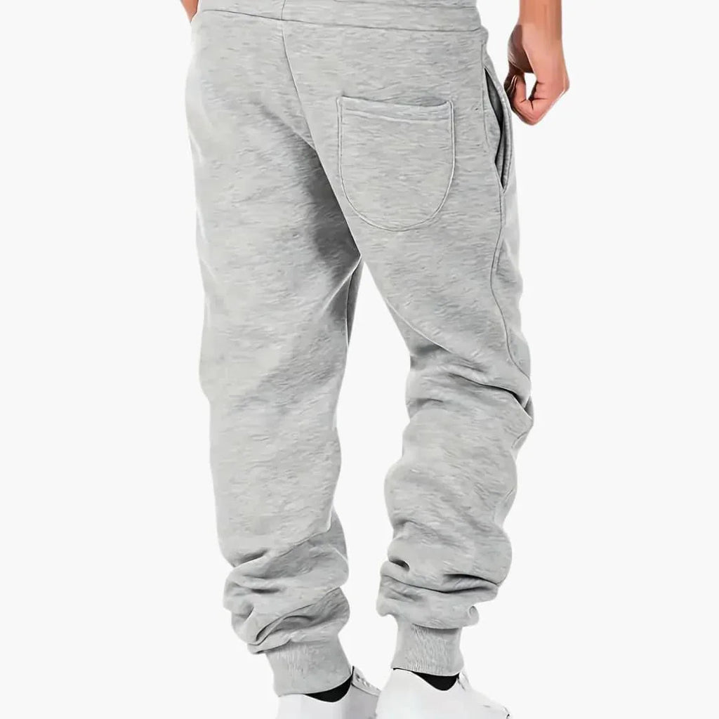 Pantaloni da jogging da uomo con polsini a coste e tasca posteriore