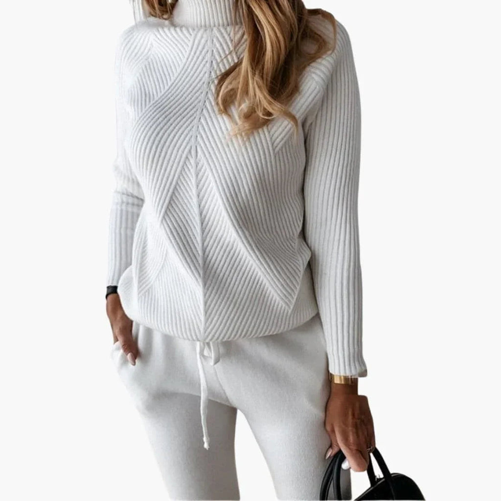 Tuta da donna in maglia con maglione a collo alto e pantaloni da jogging