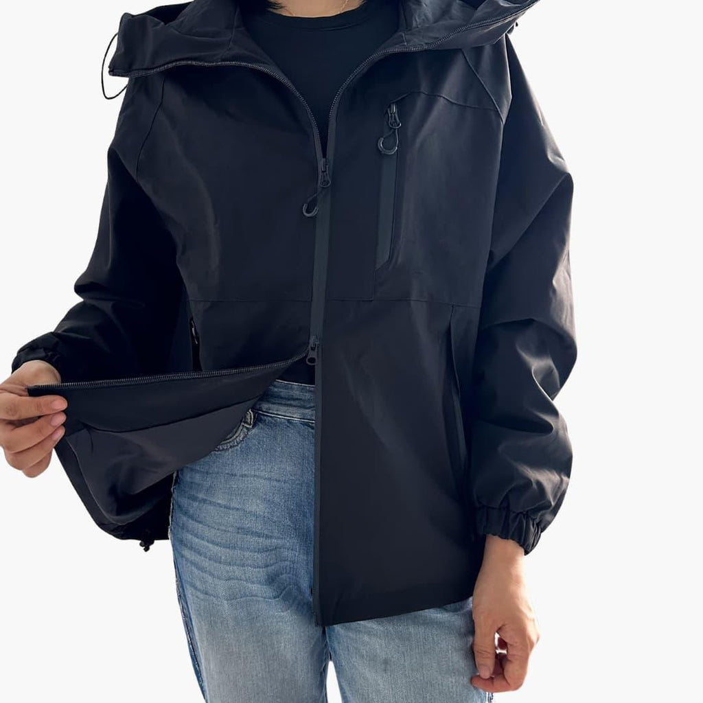 Giacca da donna con cappuccio e tasche con cerniera