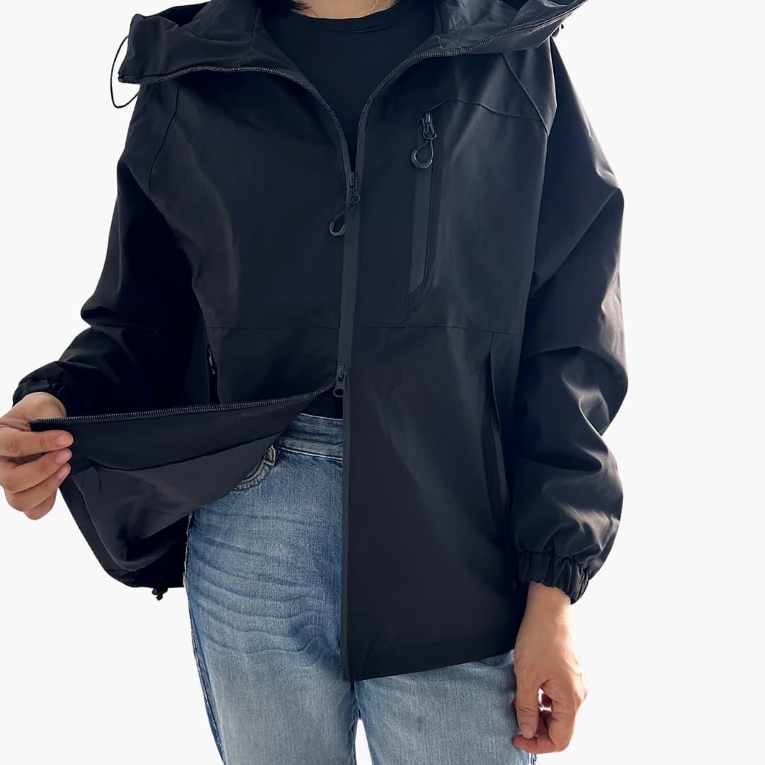 Giacca da donna con cappuccio e tasche con cerniera