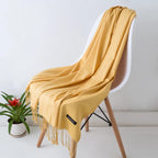 Sciarpa da donna calda e accogliente: frange lunghe, cashmere, invernale
