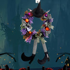 Ghirlanda per porta di Halloween | Gambe di strega con calze a righe