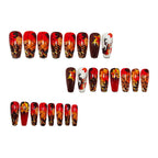 Nail art artificiale con design a foglie autunnali