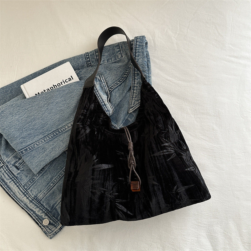 Borsa a tracolla versatile in velluto