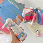 Ombrello pieghevole automatico da donna con gioco di colori unico