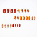 Nail art con design a foglia autunnale