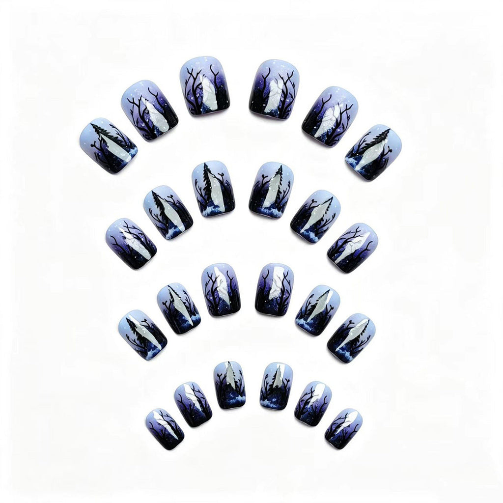 Nail art artificiale con motivo foresta invernale