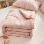 Piumino comfort da donna con delicato motivo floreale e imbottitura di alta qualità