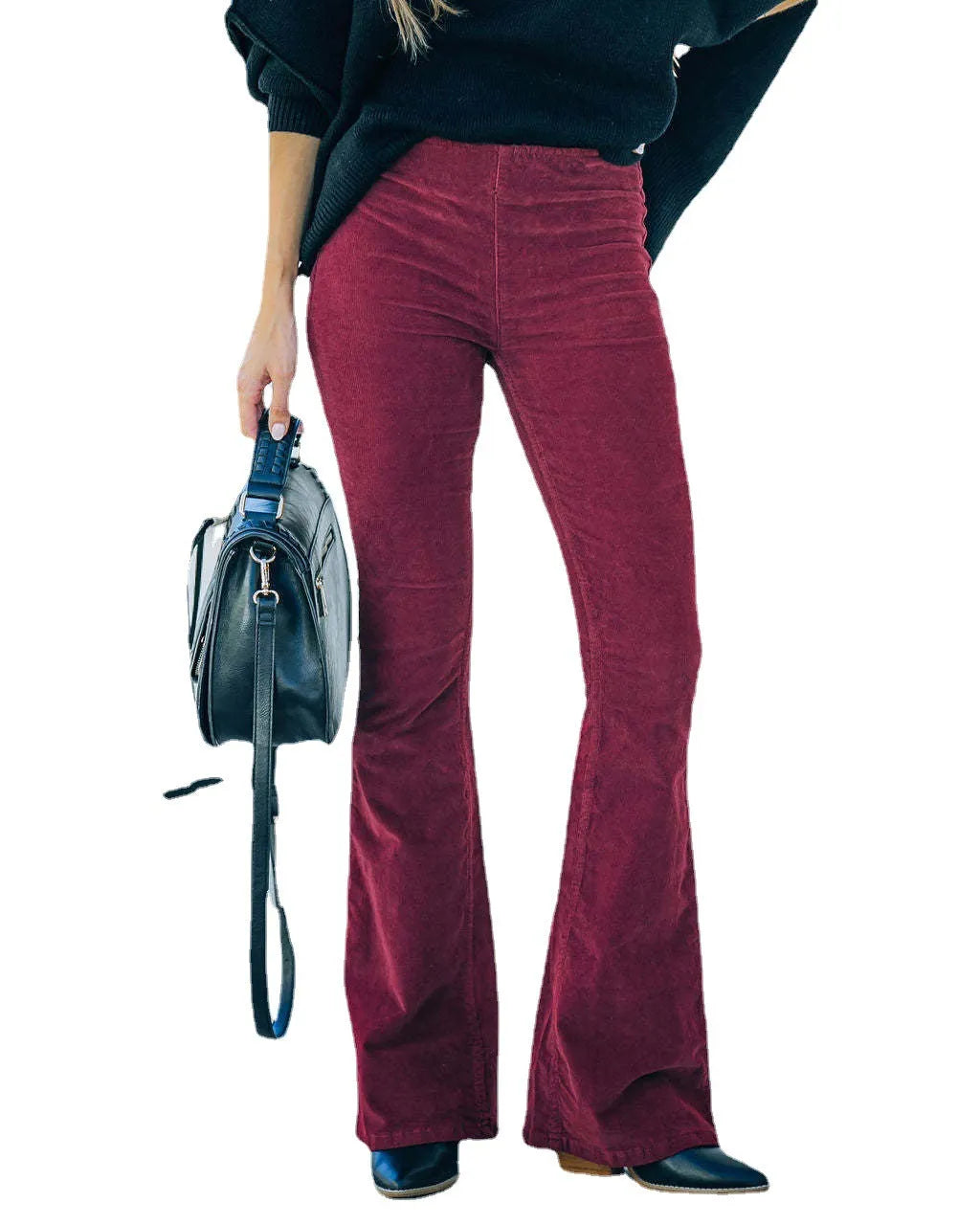 Pantaloni larghi a coste da donna con vita elasticizzata e gambe svasate, comodi ed eleganti
