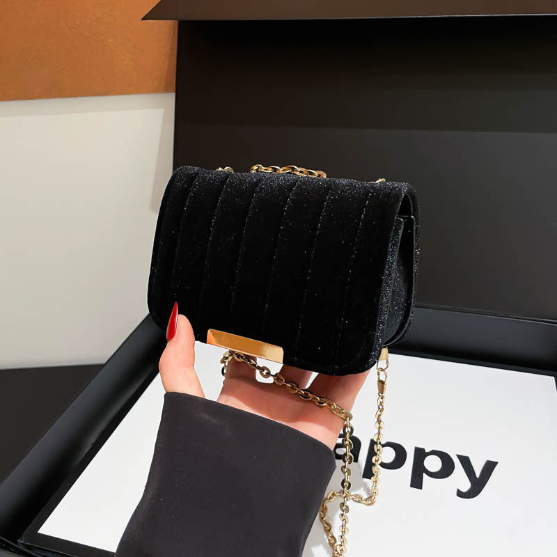 Elegante borsa a tracolla in velluto trapuntato