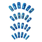 Nail art glitterata a tema invernale festivo