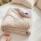 Piumino comfort da donna con delicato motivo floreale e imbottitura di alta qualità