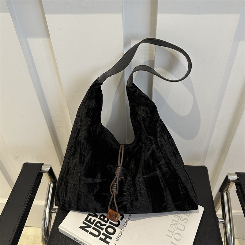 Borsa a tracolla versatile in velluto