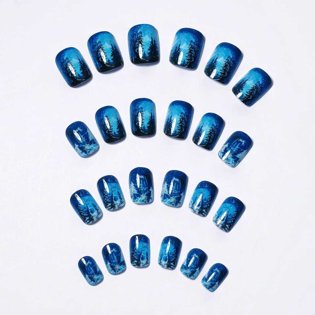 Nail art artistica nella foresta invernale