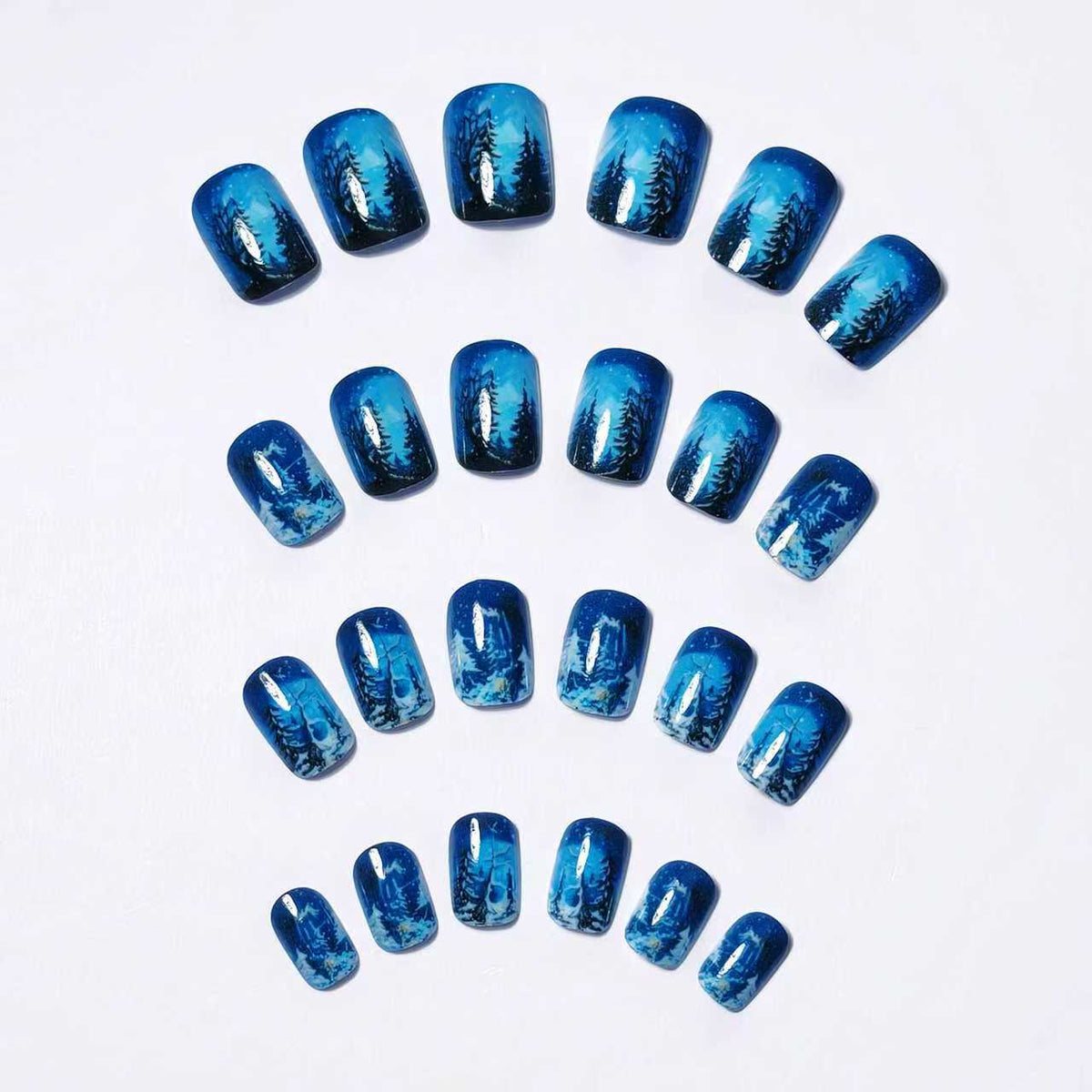 Nail art artistica nella foresta invernale