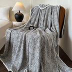 Coperta in pile lavorata a maglia