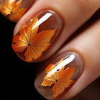Nail art con motivo a foglie autunnali
