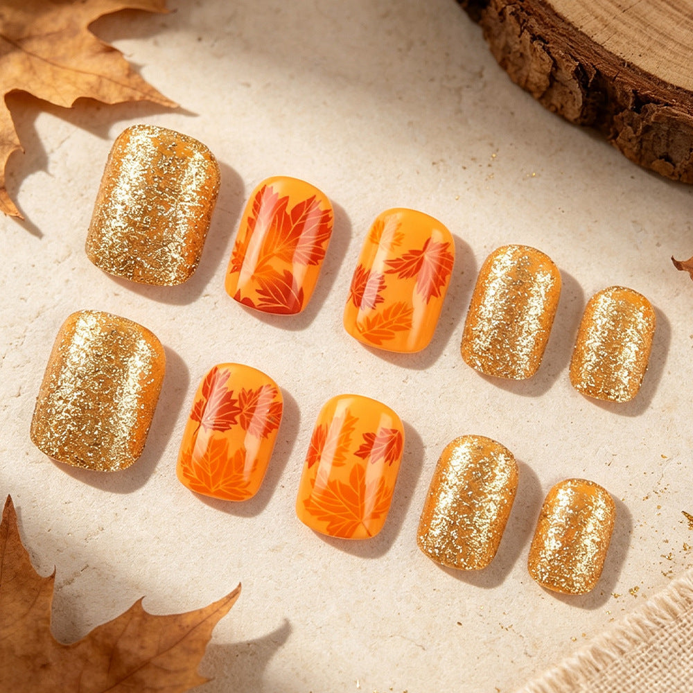 Nail art a pressione con foglie autunnali