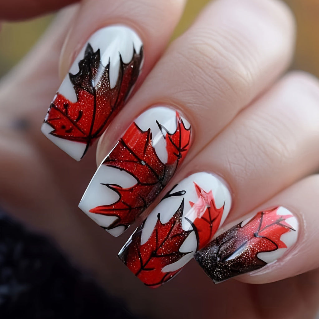 Nail art artistica con foglie autunnali