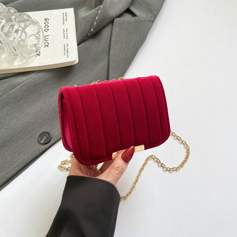 Elegante borsa a tracolla in velluto trapuntato