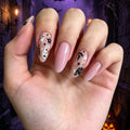Design artistico per unghie a pressione a tema Halloween