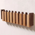 Appendiabiti da parete in legno con design a pianoforte, fatto a mano in colore naturale