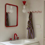 Appendiabiti da parete in ghisa nera con design ondulato per ingresso, camera da letto o bagno
