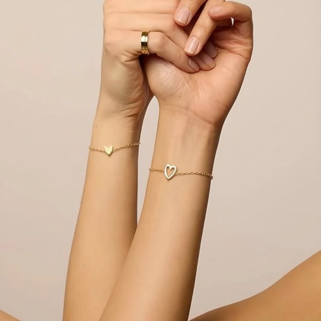 Bracciale regolabile con ciondolo a cuore abbinato per coppia