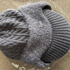 Cappello invernale Trapper con paraorecchie lavorato a maglia