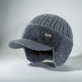 Cappello invernale Trapper con paraorecchie lavorato a maglia