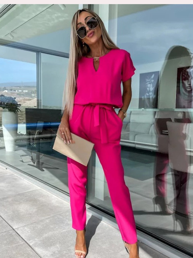 Tuta chic da donna a maniche corte con cintura - Stile versatile