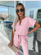 Tuta chic da donna a maniche corte con cintura - Stile versatile