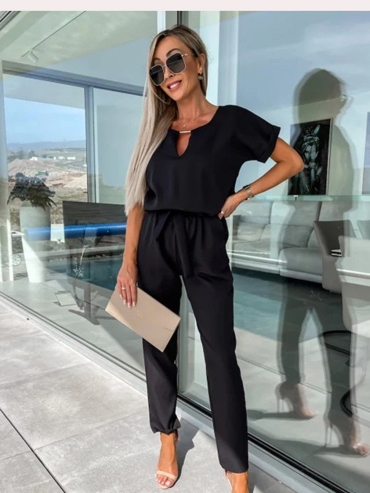 Tuta chic da donna a maniche corte con cintura - Stile versatile