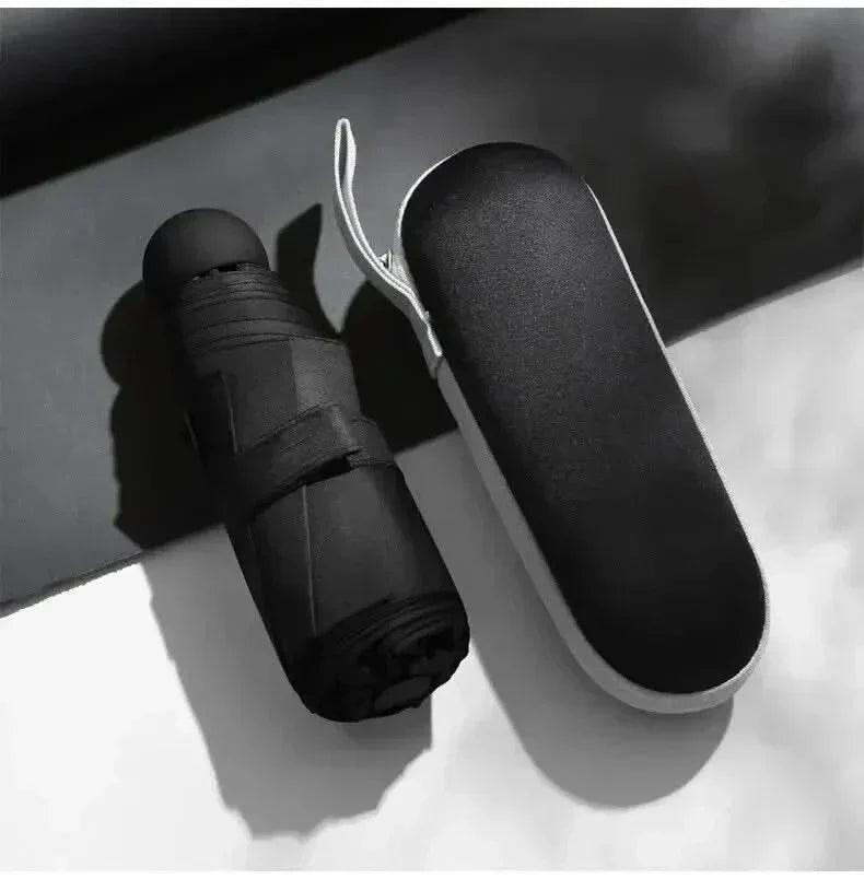 Ombrello da viaggio compatto unisex: protezione dalla pioggia elegante e ultraportatile