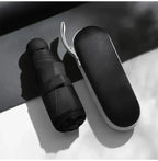 Ombrello da viaggio compatto unisex: protezione dalla pioggia elegante e ultraportatile