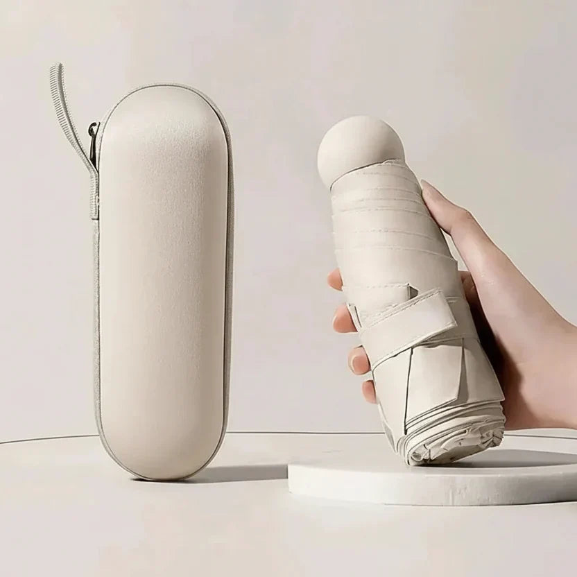Ombrello da viaggio compatto unisex: protezione dalla pioggia elegante e ultraportatile