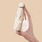 Ombrello da viaggio compatto unisex: protezione dalla pioggia elegante e ultraportatile