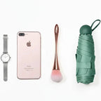 Ombrello da viaggio compatto unisex: protezione dalla pioggia elegante e ultraportatile