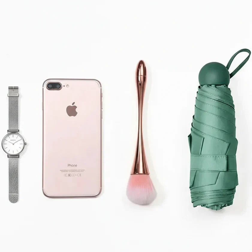 Ombrello da viaggio compatto unisex: protezione dalla pioggia elegante e ultraportatile