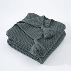 Accogliente coperta scandinava in lana lavorata a maglia