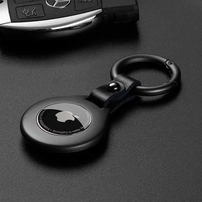 Custodia protettiva in pelle di alta qualità con ciondolo in metallo per Apple Airtags